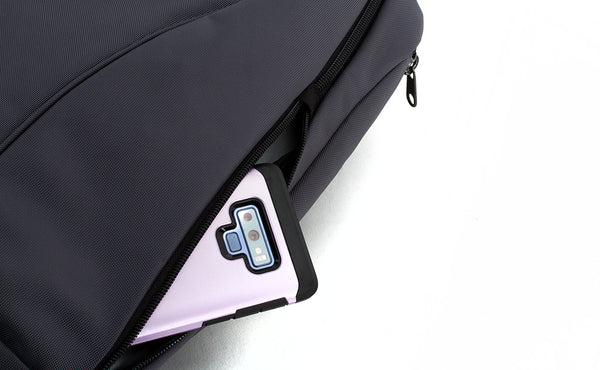 A phone in the small side pocket.